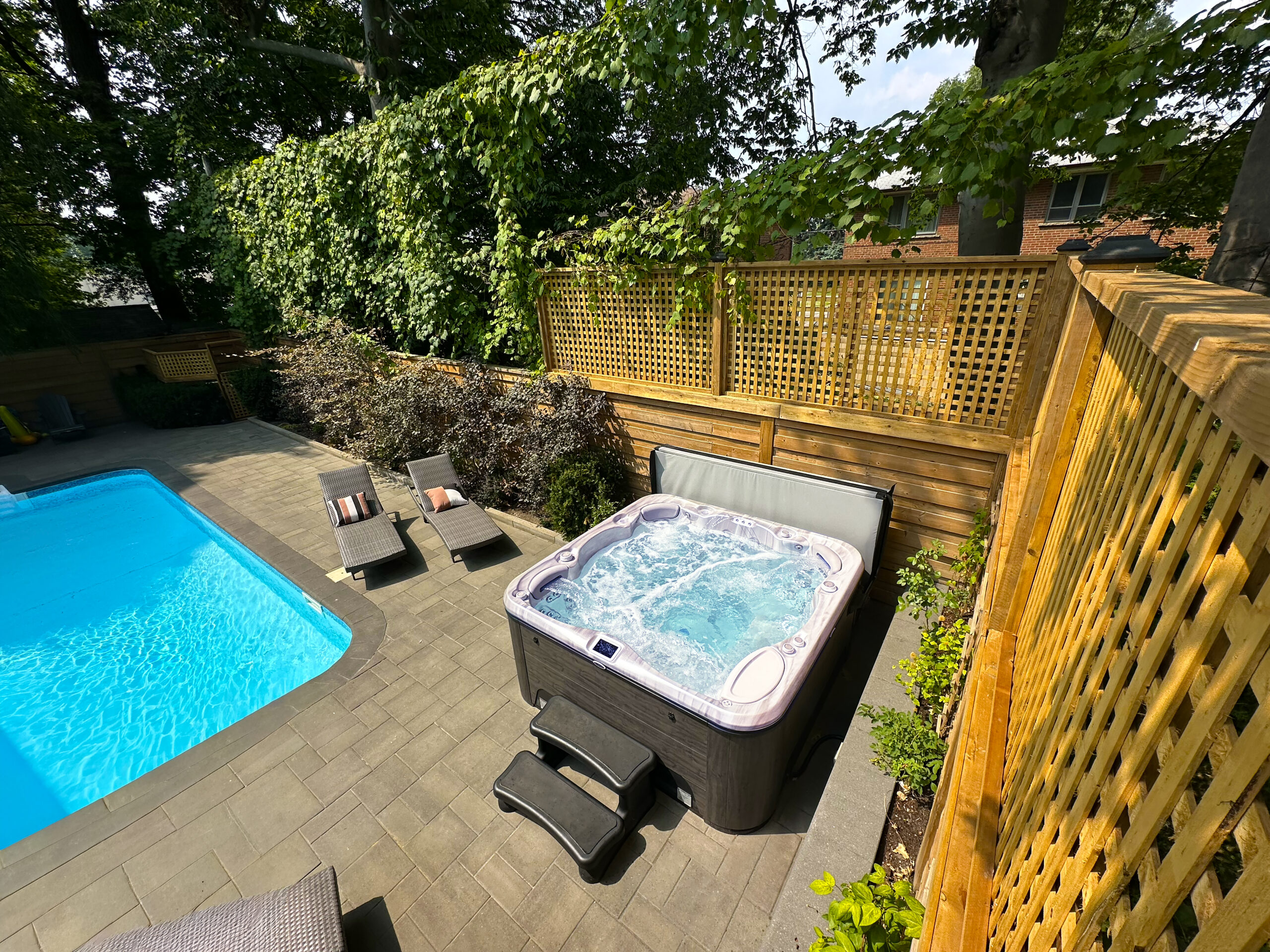 hp25 signature 779p anniv. hot tub install daytime overhead toronto image1890 scaled
